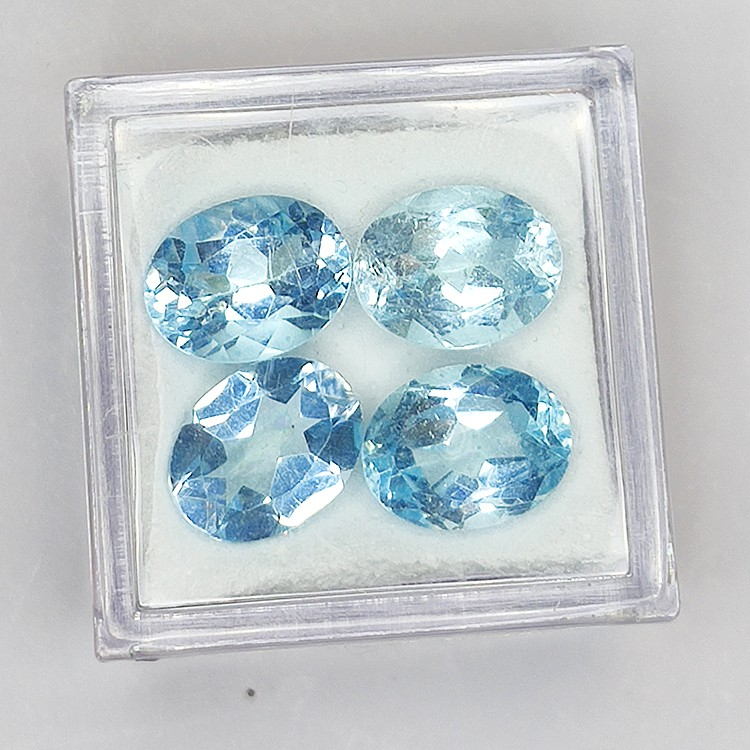 Edelstenen BLAUW TOPAAS en OVAAL SNIJWERK 4.92ct. 6x4mm. 10st.