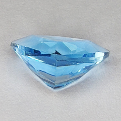 Gemme di TOPAZIO BLU in SFACCETTATO TRILLION di  3.54ct. 10.3 X 10.4 mm.