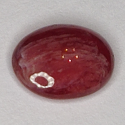 1.70ct Rubino Stella cabochon ovale 8x6mm