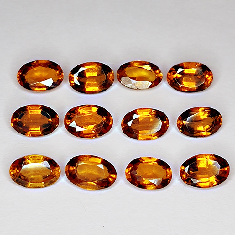 6.73ct Grenat Hessonite coupe ovale 6x4mm 12pc