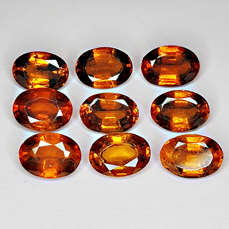 9.69ct Hessonite Granato taglio ovale 7x5mm 9pcs