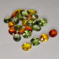 7,74ct Saphir Songea multicolore coupe ovale 4,5x3,5mm 25pc