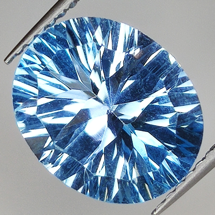 Blue topaz oval cut millenium 12x10mm 1pc