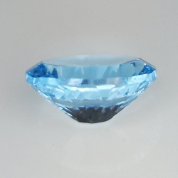 Topacio azul talla oval millenium 12x10mm 1pz