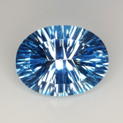 Topacio azul talla oval millenium 16x12mm 1pz