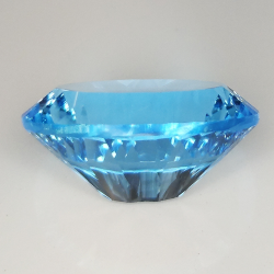 Topacio azul talla oval millenium 16x12mm 1pz