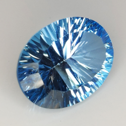 Topacio azul talla oval millenium 16x12mm 1pz