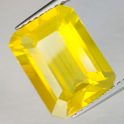 3.75ct opale de feu taille émeraude 12,5x9,2x5,7 mm