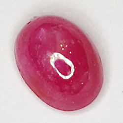 1.28ct Rubino Stella cabochon ovale 6.6x4.9mm