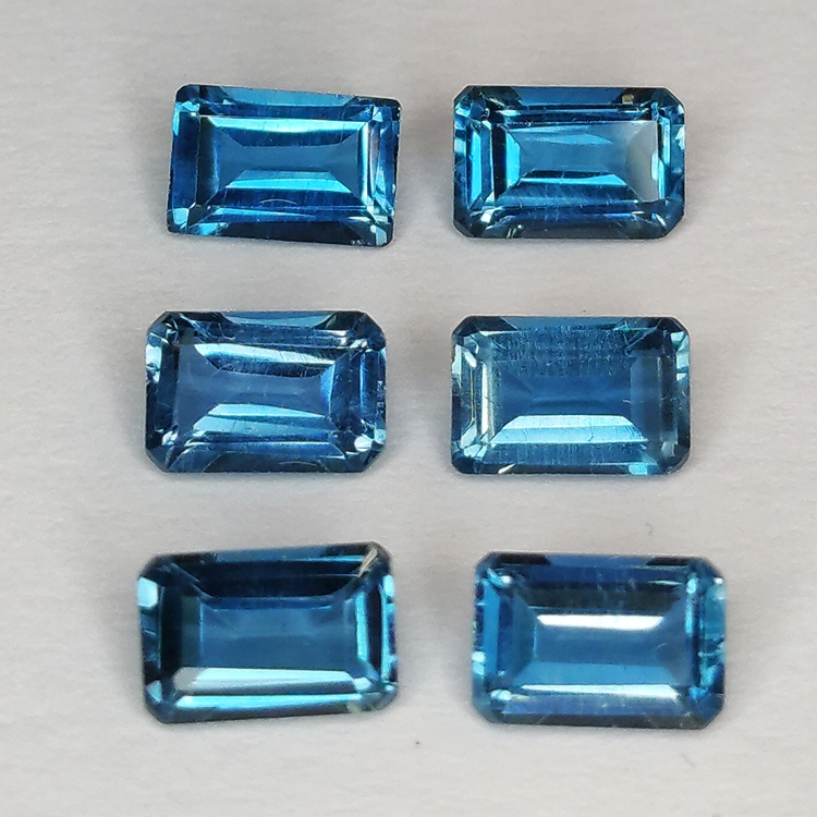 Londoner Topas blau Smaragdschliff 6x4mm 6pz