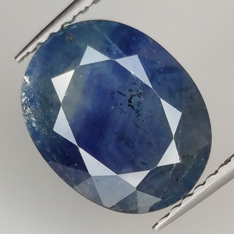 4.09ct Zaffiro Blu effetto seta taglio ovale 10.8x8.7mm