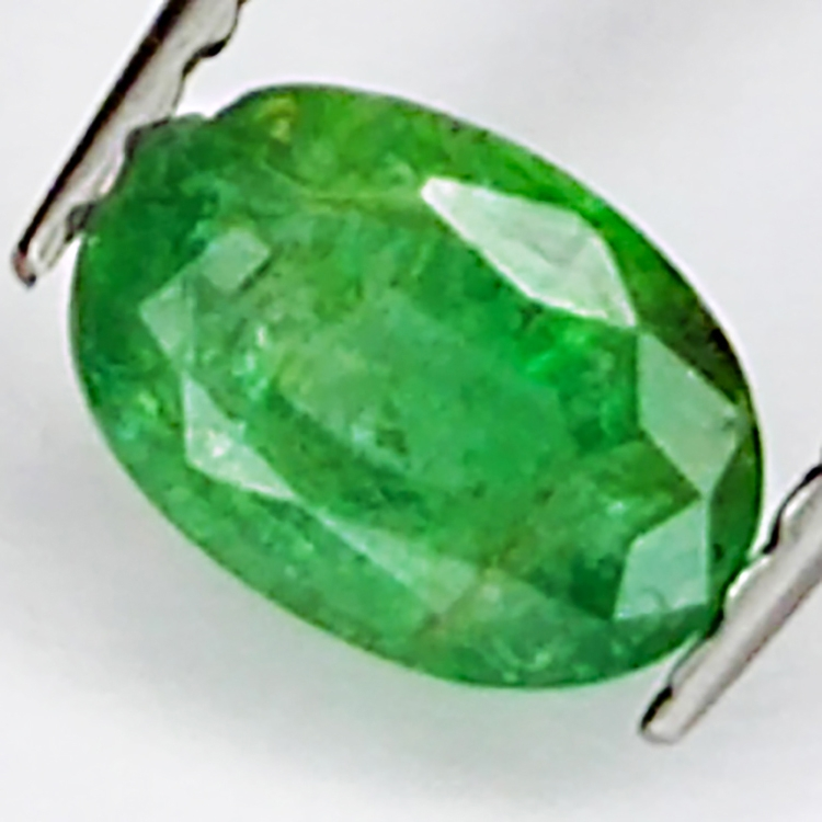 0.56ct Emerald oval cut 6.4x4.5mm