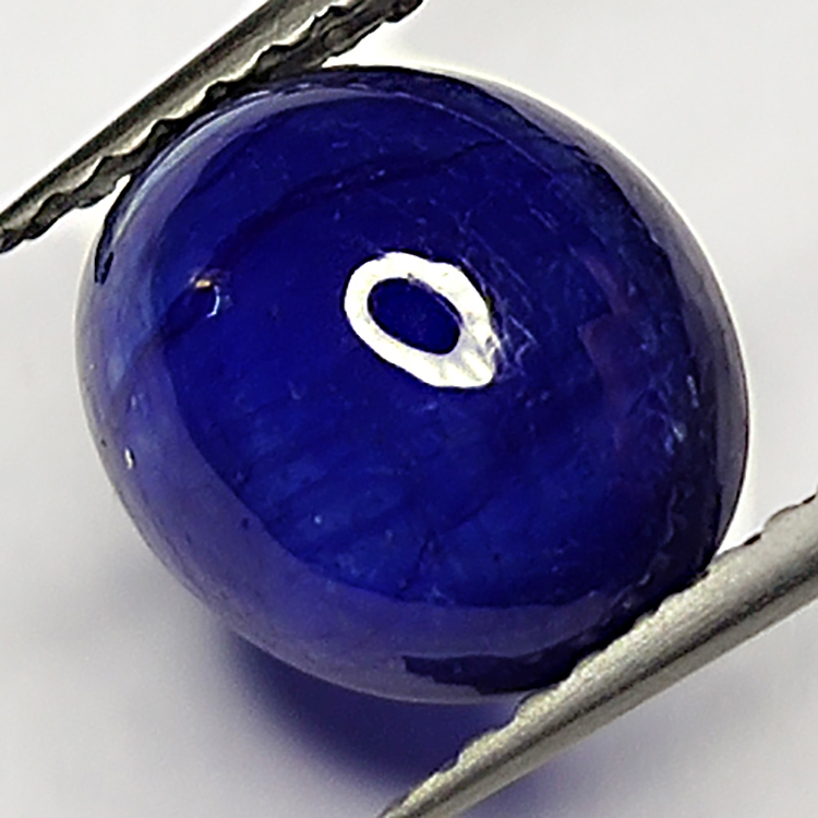 3.37ct Zaffiro Blu cabochon ovale 9.3x7.9mm