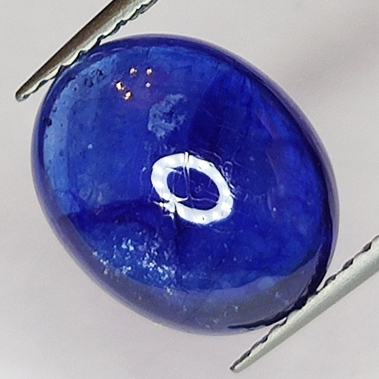 5.74ct Bleu Saphir cabochon ovale 11.5x9.2mm