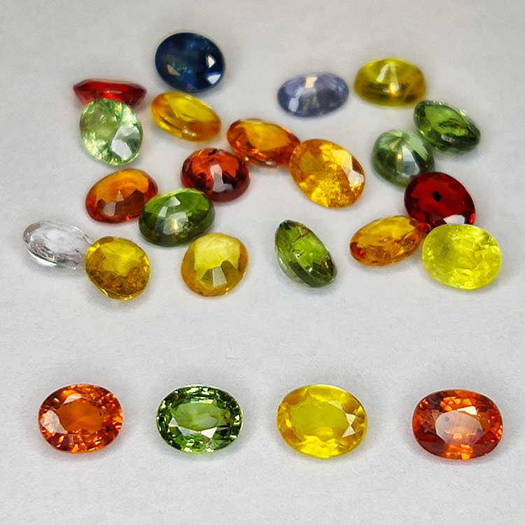 8.87ct Saphir Songea multicolore coupe ovale 4.8x3.7mm 24pcs