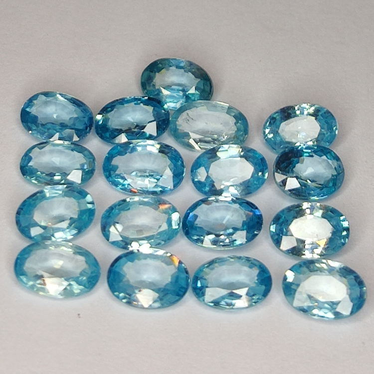 10.04ct Zircón Azul talla oval 5.9x4.1mm 17pz