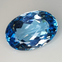 14.33ct Topaze bleue coupe ovale 17.7x12.4mm