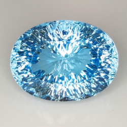 20.98ct Topaze Bleue coupe ovale 18.2x13.7mm