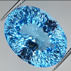 20.98ct Topaze Bleue coupe ovale 18.2x13.7mm