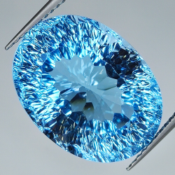 20.98ct Topaze Bleue coupe ovale 18.2x13.7mm