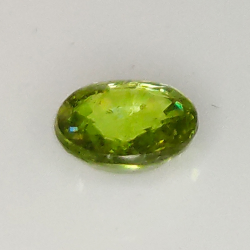 0.40ct Demantoid Garnet oval cut 4.8x4.4mm