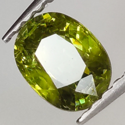 0.71ct Demantoid-Granat ovalerschliff 6.0x4.6mm