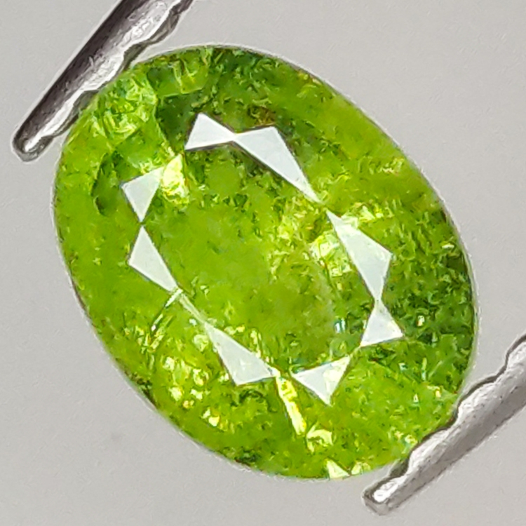 0.67ct Demantoid Garnet oval cut 5.9x4.3mm