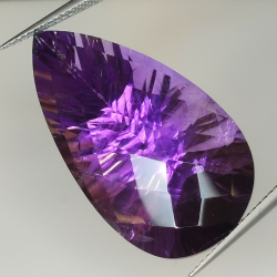 29.44ct Amethyst millenium pear cut with checkerboard 30.4x16.7mm