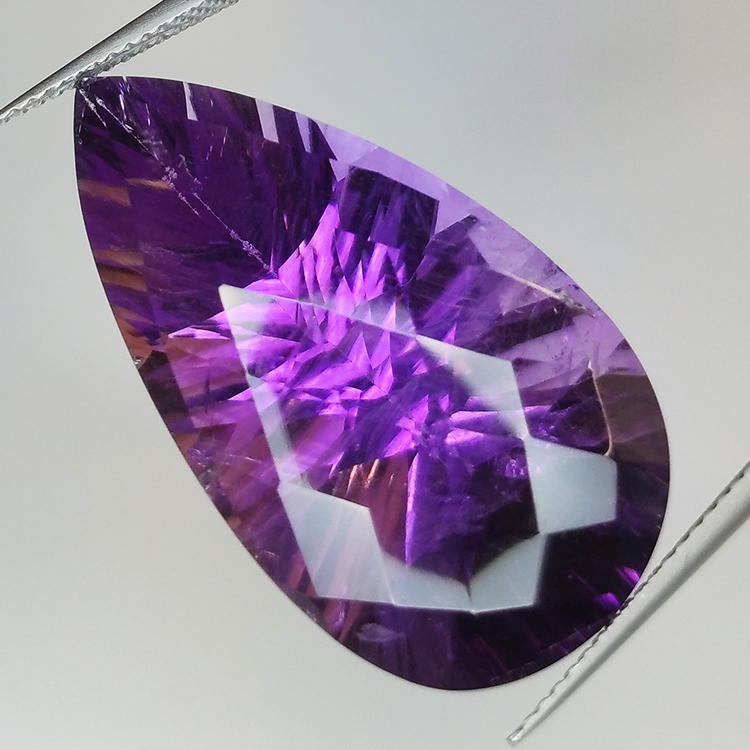 29.44ct Amethyst millenium pear cut with checkerboard 30.4x16.7mm