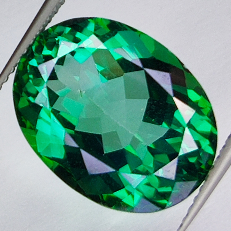 12.68ct Topacio Verde talla oval 15.8x12.4mm