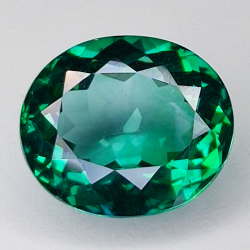 10.24ct Topaze Verte ovale coupe 14.2x12.3mm