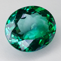 10.24ct Topaze Verte ovale coupe 14.2x12.3mm