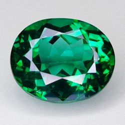 8.51ct Topaze Verte coupe ovale 13.1x10.5mm