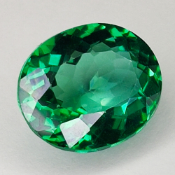 9.81ct Grüner Topas ovalschliff 14.0x11.9mm