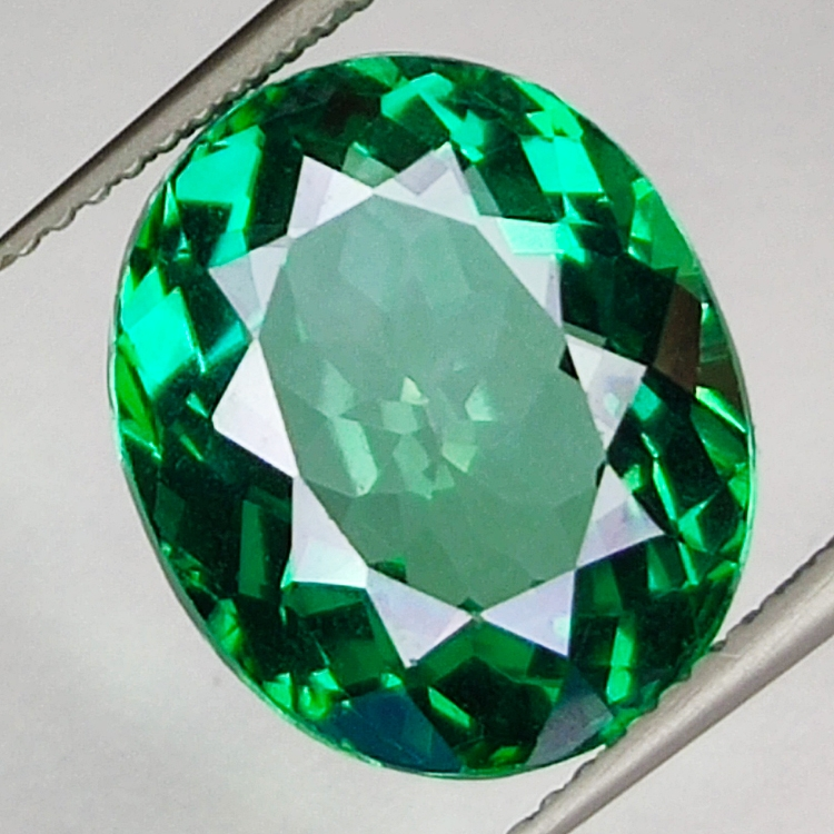 9.81ct Green Topaz oval cut 14.0x11.9mm