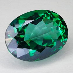 13.29ct Topaze Verte ovale coupe 16.1x12.2mm