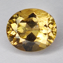 6.67ct Champagne Topaz taglio ovale 12.1x10.1mm