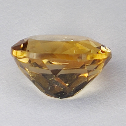 6.67ct Champagne Topaz taglio ovale 12.1x10.1mm