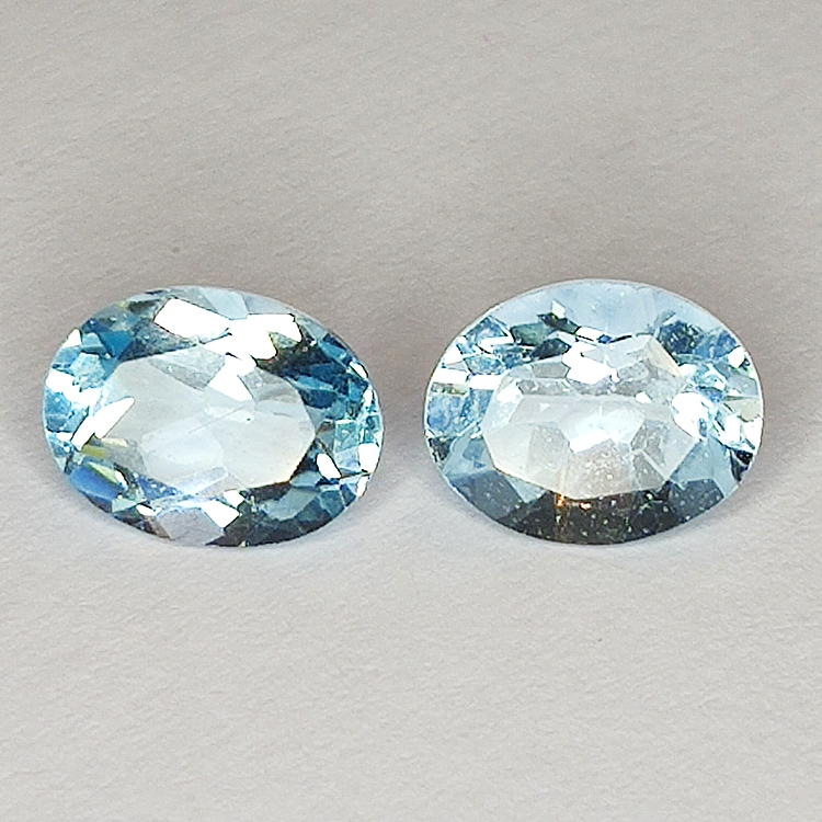 4.89ct Paire Topazes Bleues coupe ovale 8.9x7.1mm