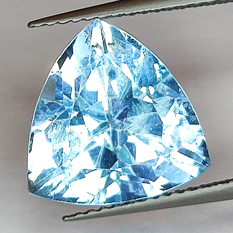 7.73ct Blue Topaz trilliant cut 12.3x12.2mm