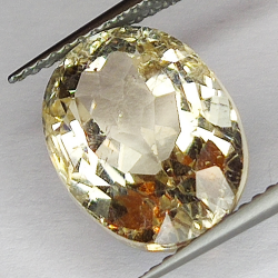 8.49ct Champagne Topaz taglio ovale 13.5x10.0mm