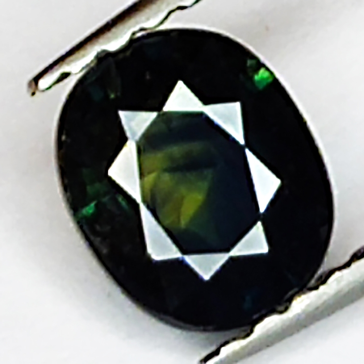 0.76ct Saphir Vert coupe ovale 6.0x5.0mm