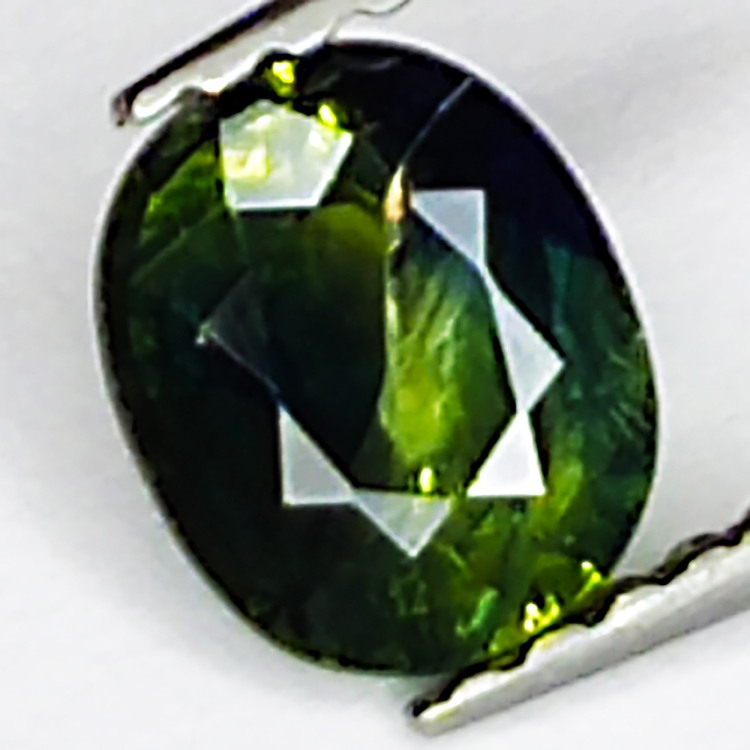 0.77ct Saphir Vert coupe ovale 6.0x5.0mm