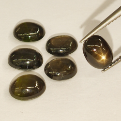 9.73ct Black Star Sapphire cabochon oval 7.6x6.2mm 6pc