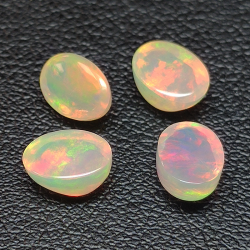 Calibrated oval cabochon cut opal