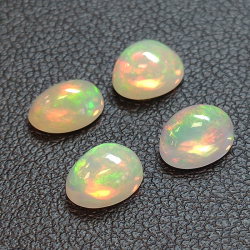 Calibrated oval cabochon cut opal