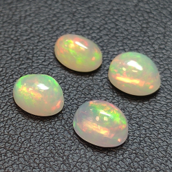 Calibrated oval cabochon cut opal