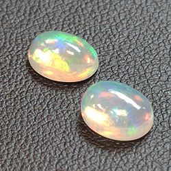 Calibrated oval cabochon cut opal