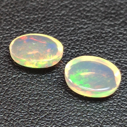 Calibrated oval cabochon cut opal