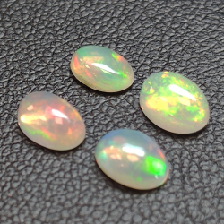 Calibrated oval cabochon cut opal